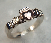 Tri-color claddagh ring with 2 -.05ct diamonds